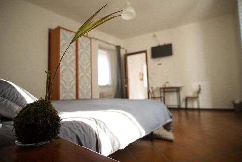 Postel nebo postele na pokoji v ubytování A D Rooms - Il Campanile