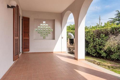 an entrance to a house with a brick walkway at Casa Bianca Bruino, privacy e confort in Bruino