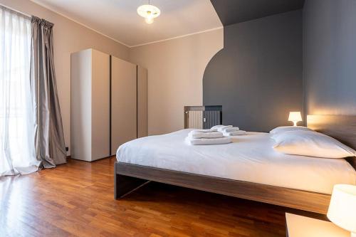 En eller flere senger på et rom på Casa Bianca Bruino, privacy e confort