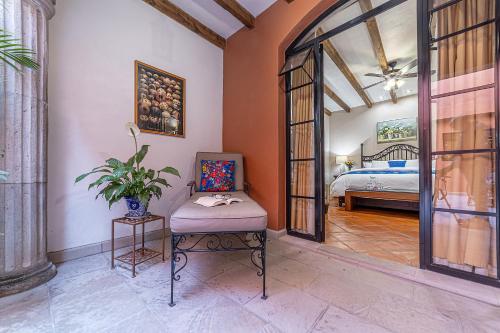 Postel nebo postele na pokoji v ubytování CASA GOLDY