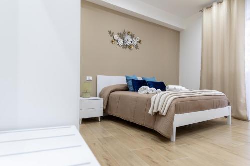 Giường trong phòng chung tại ARIA b&b
