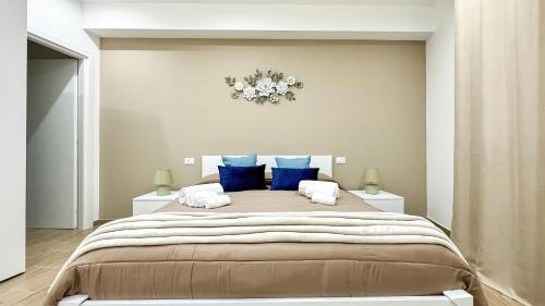 Postel nebo postele na pokoji v ubytování ARIA b&b