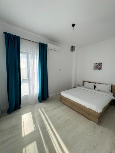 Кровать или кровати в номере VISAJ Residence