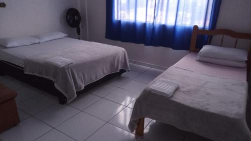 Posteľ alebo postele v izbe v ubytovaní BROKS Hotel e Restaurante