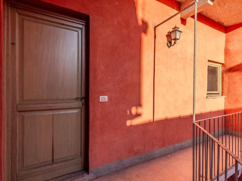 a door on the side of a building at Apartment Claudio by Interhome in Luino