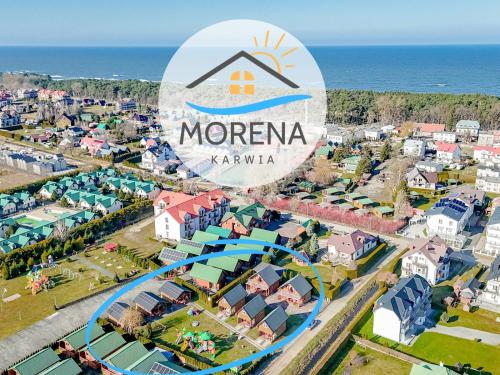 an aerial view of a resort with a water park at Domki Morena - Rodzinne Domki Blisko Plaży in Karwia