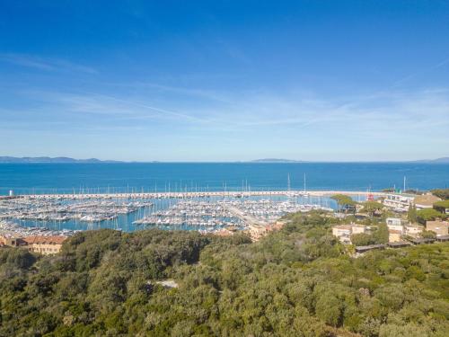 an aerial view of a harbor with a marina at Apartment A 33 by Interhome in Punta Ala