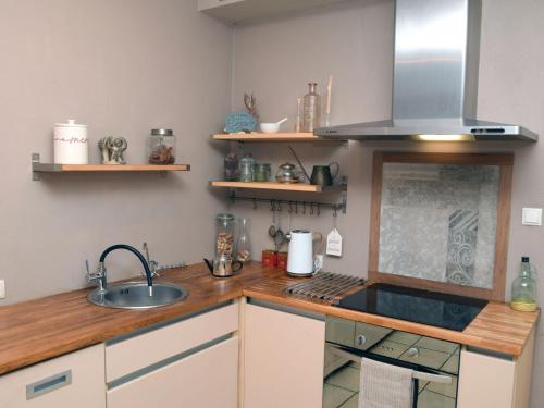 una cucina con lavandino e piano di lavoro di Holiday Home Wieliczka by Interhome a Wieliczka