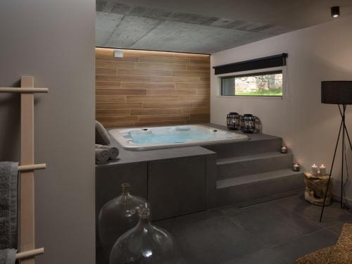 a jacuzzi tub in a room with stairs at Villa Melon by Interhome in Poreč