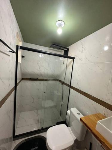 Bilik mandi di Aconchegante Suite green