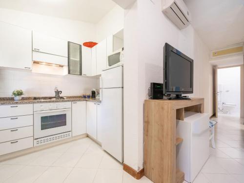 Η κουζίνα ή μικρή κουζίνα στο Apartment Porru by Interhome