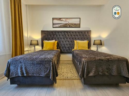 Lova arba lovos apgyvendinimo įstaigoje Memel Stay apartments, Self check - in- Nemokamas parkingas