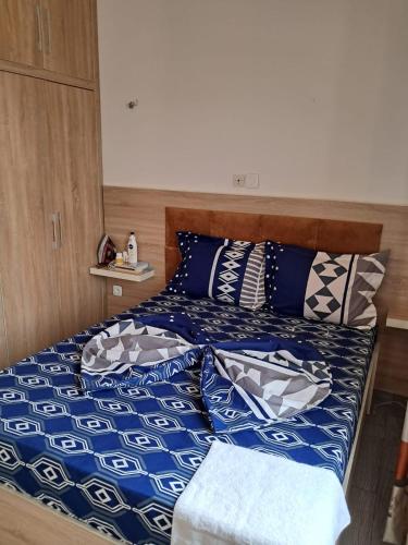Un ou plusieurs lits dans un hébergement de l'établissement Residence New Standing Douala CITE CHIRAC YASSA