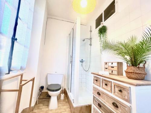 a bathroom with a toilet and a shower at AA OT Maison du Moulin - Old Town - Promenade des in Nice