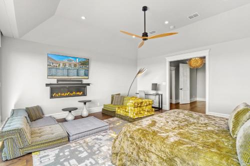 a living room with a couch and a fireplace at Fortaleza l Luxury 8 BR, 7,000+ sqft Palace on 3 Acres with Pickleball & Basketball Court in Helotes