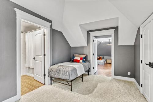 a bedroom with a bed and a white ceiling at Fortaleza l Luxury 8 BR, 7,000+ sqft Palace on 3 Acres with Pickleball & Basketball Court in Helotes