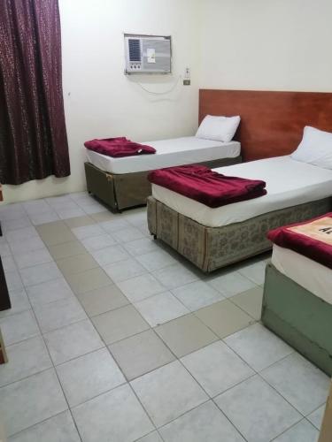 Posteľ alebo postele v izbe v ubytovaní فندق دبار الموحدين