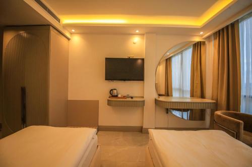Televisyen dan/atau pusat hiburan di GÖRGÜLÜ HOTEL