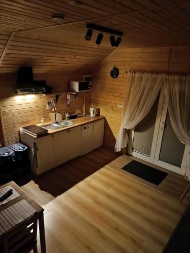 a kitchen with a sink and a counter top at Spiska Dolina in Łapsze Niżne