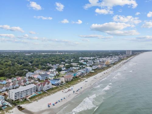 an aerial view of a beach with buildings and the ocean at Newly Renovated Condo with Beach access steps away in Myrtle Beach