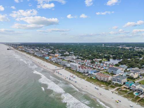 an aerial view of a beach with condos at Newly Renovated Condo with Beach access steps away in Myrtle Beach