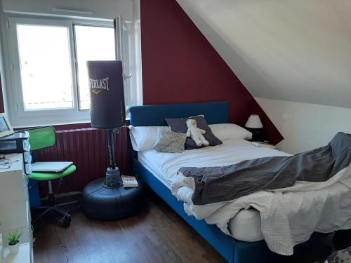 Postel nebo postele na pokoji v ubytování L'instant présent - Chambre Alyzée