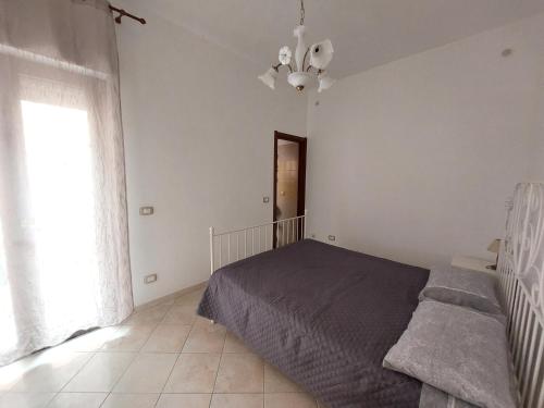 Postel nebo postele na pokoji v ubytování Fronte porto apartment 2