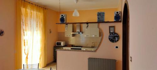 Кухня или кухненски бокс в Casa di Anna