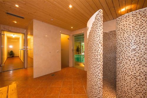 a hallway of a house with a room with a pool at Gästehaus Lärchenhang in Mittenwald