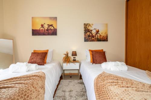Un pat sau paturi într-o cameră la Casa do Parque