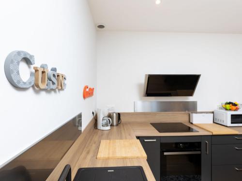 Televisyen dan/atau pusat hiburan di Apartment Garance by Interhome