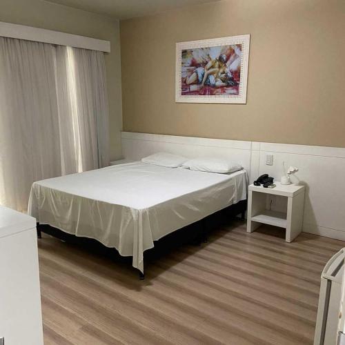 Ένα ή περισσότερα κρεβάτια σε δωμάτιο στο Hotel Guest