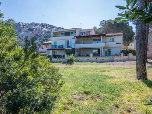 a view of a house from the yard at Apartment Palau by Interhome in Arzachena