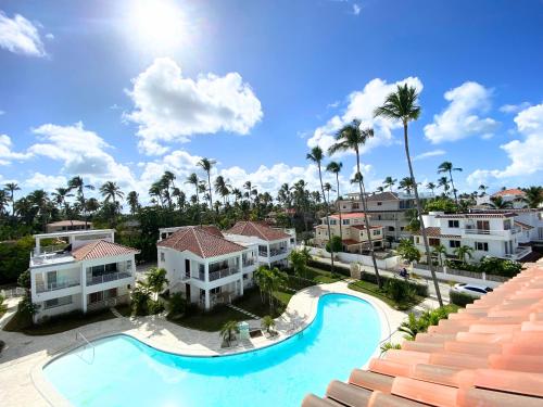 an aerial view of a resort with a swimming pool at AZUL CARAIBICO Beach Club & SPA in Punta Cana