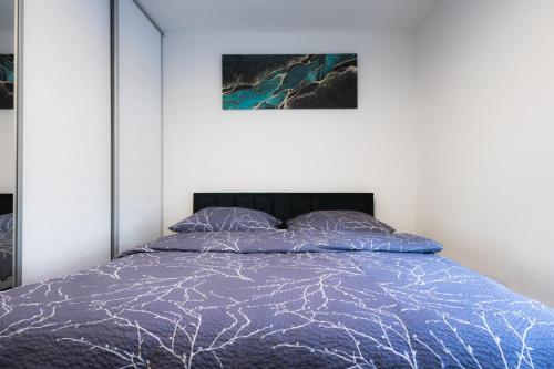 Posteľ alebo postele v izbe v ubytovaní Apartmán Banská Bystrica centrum