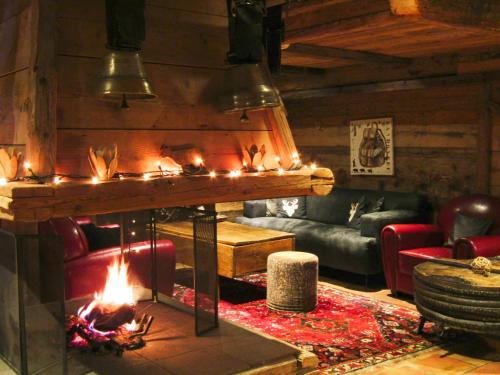 Coin salon dans l'établissement Les Grands Montets Hotel & Spa
