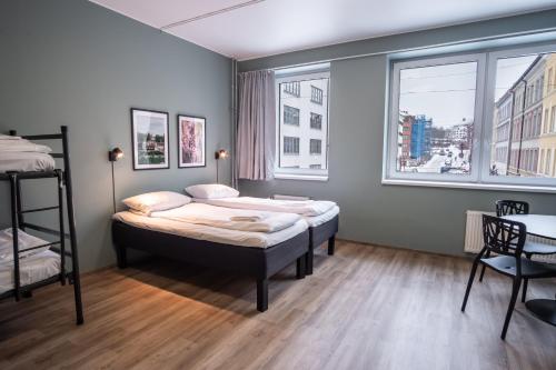 Postel nebo postele na pokoji v ubytování Bunks at Rode