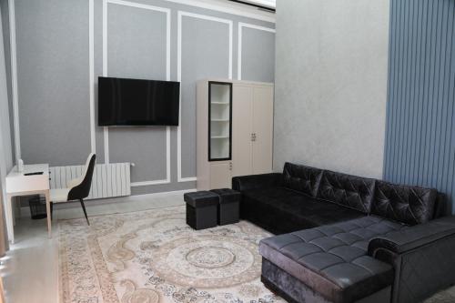 TV a/nebo společenská místnost v ubytování HOTEL SULTAN PALACE