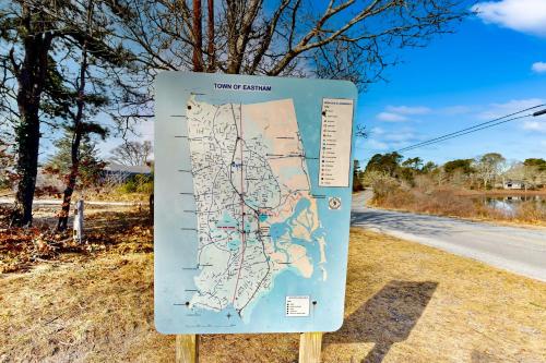 a sign on the side of a road at Eastham Glen in Eastham