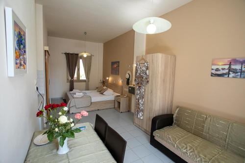 Un lugar para sentarse en Rania Studio with sea view