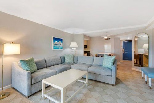 a living room with a couch and a table at Omni Hilton Head Oceanfront Resort in Hilton Head Island