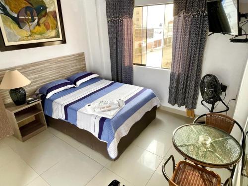 Katil atau katil-katil dalam bilik di Hostal Ocean Pacifico