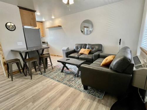 a living room with a couch and a table at Angel Rock Rentals of Moab Unit 11 in Moab