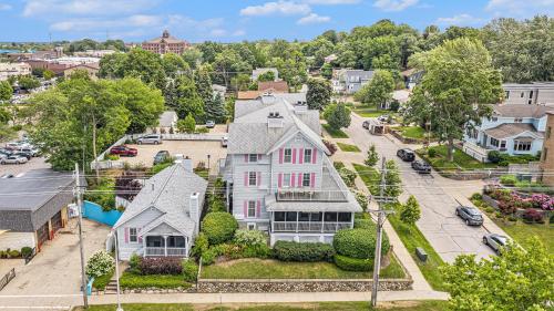 an aerial view of a large white house at Harbor House Inn in Grand Haven