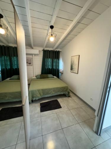 Postel nebo postele na pokoji v ubytování Villa citron