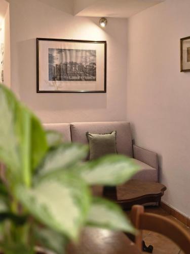 a living room with a couch and a table at Residence Internazionale in Pietrasanta