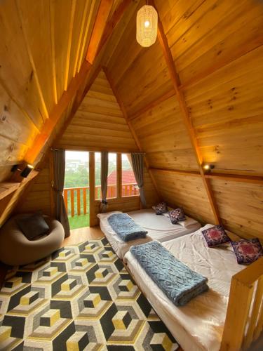 Postel nebo postele na pokoji v ubytování Calla Cabin 2