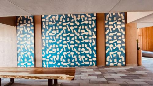 a wall with a blue and white pattern on it at Ocean View Retreat with Pool and Jacuzzi in Tijuana