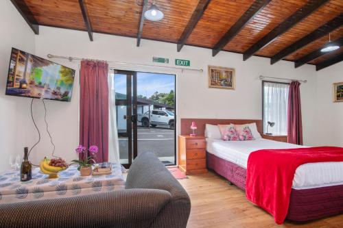 Postel nebo postele na pokoji v ubytování Grange Motel