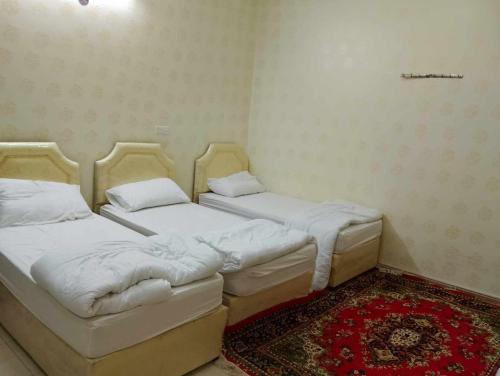 Voodi või voodid majutusasutuse عمارة سكنية مخدومة قريبه من الحرم toas